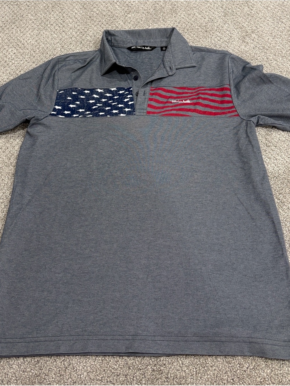 TravisMathew Grey Polo with Navy and Red Flag Chest Panels